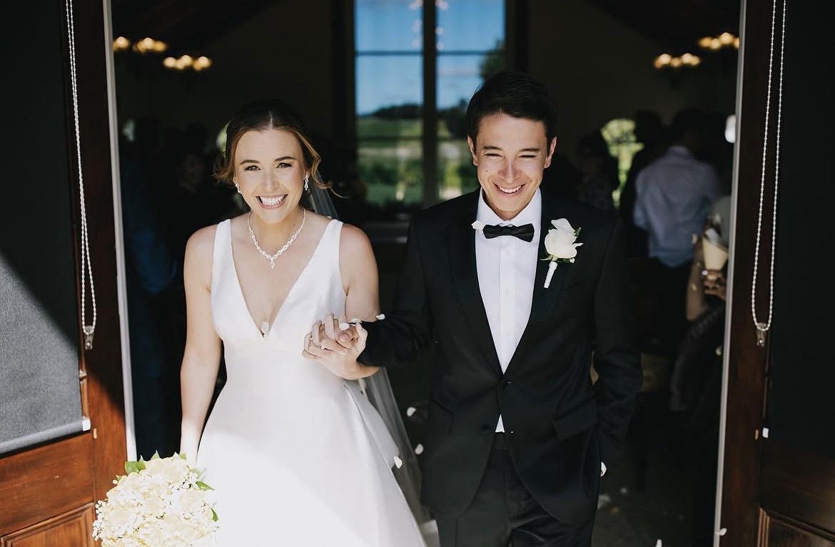A couple celebrating after their wedding ceremony